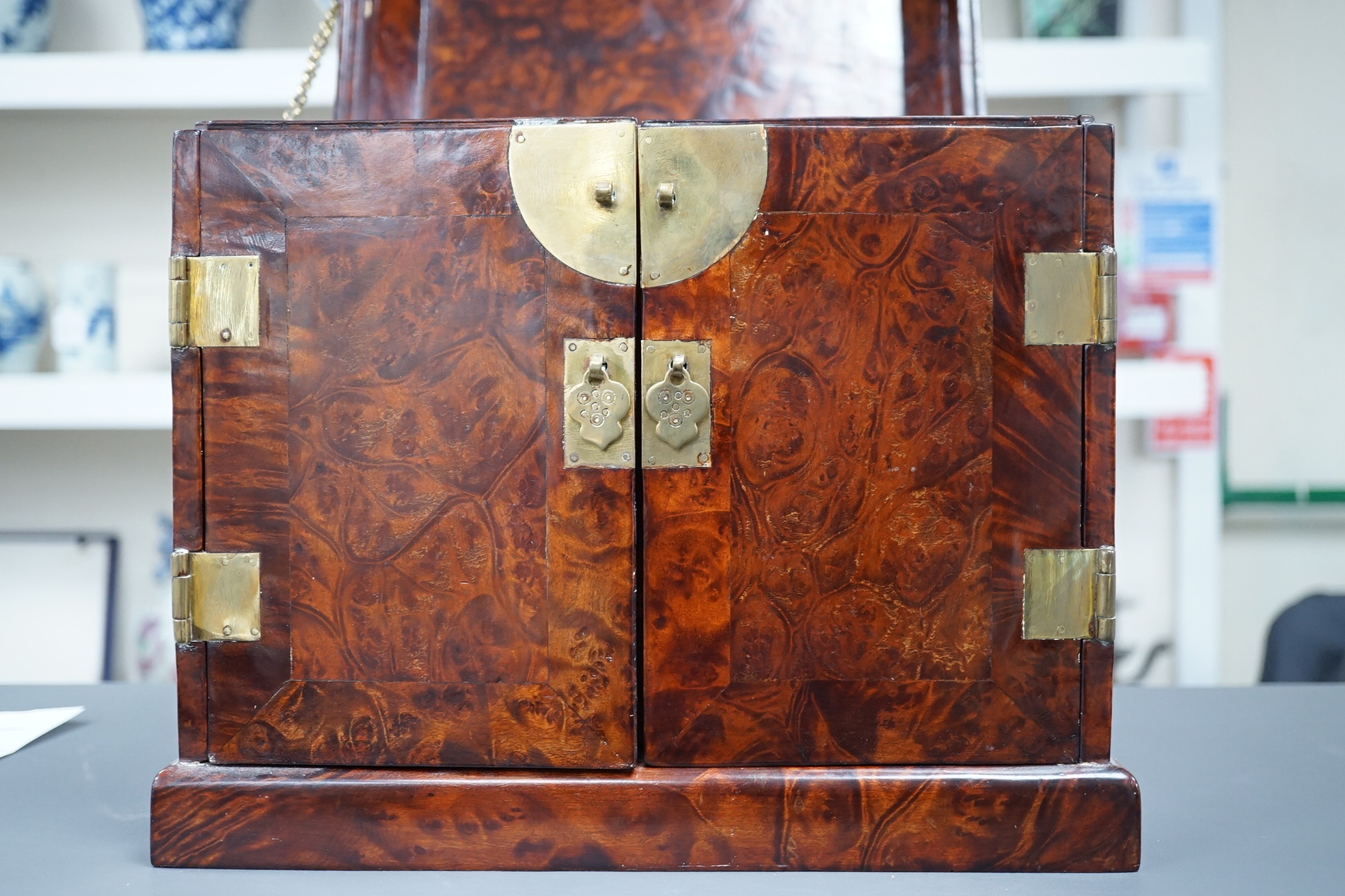 A Chinese burrwood scholar's cabinet, 19th century